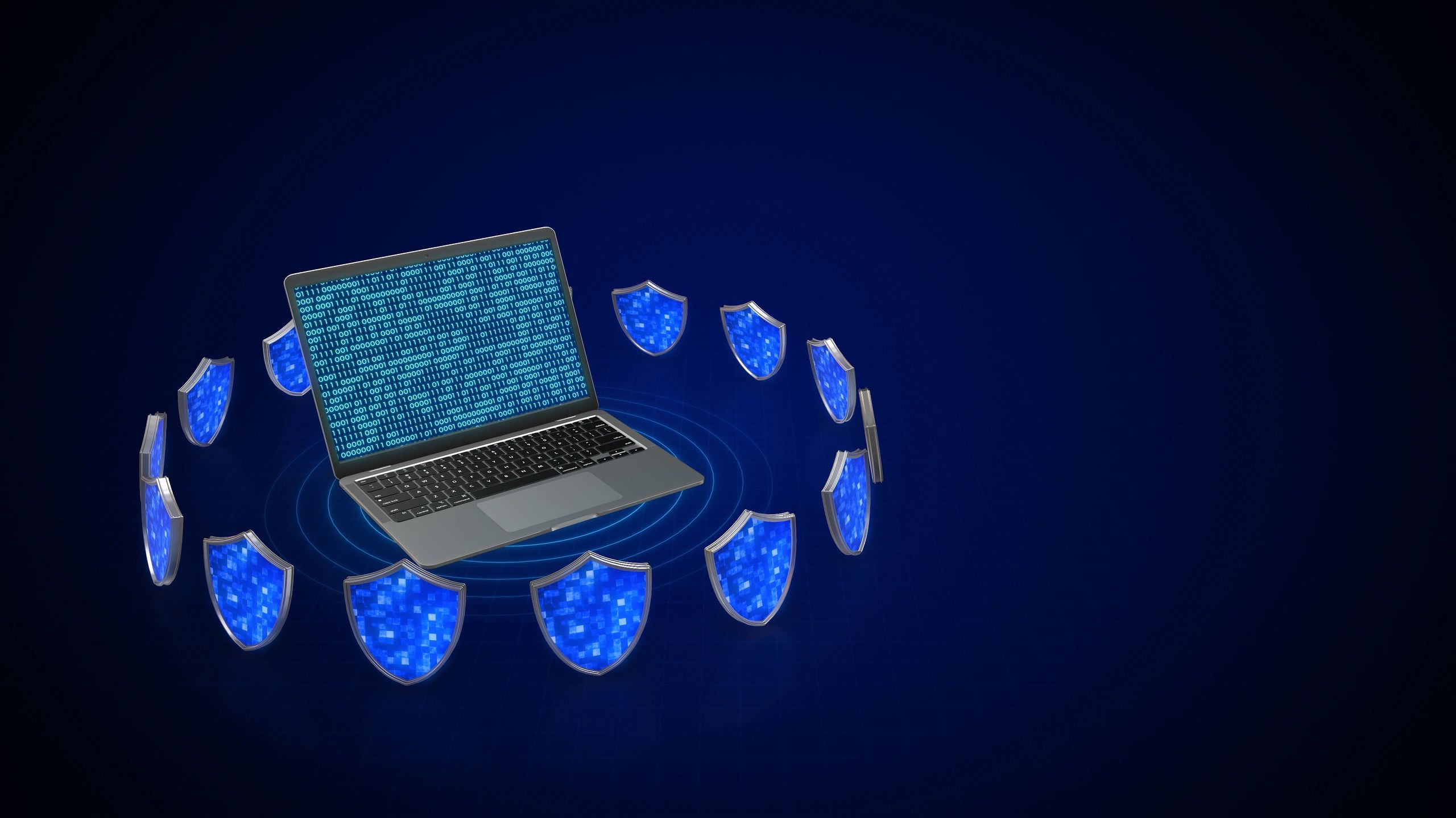 Cybersecurity-themed blue image with laptop and digital shield icons